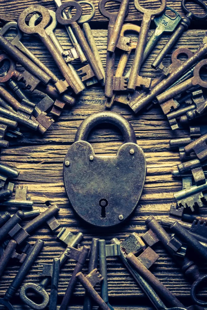 Old locks and keys on an old wooden table